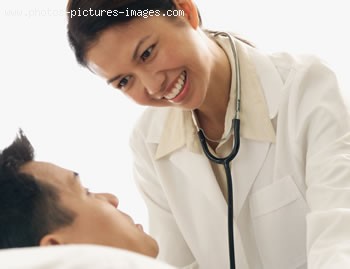 Patien in bed and nurse